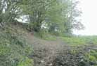 The ditch of Wansdyke is all but filled in by slippage of the bank over 1300 - 1500 years of soil erosion. Looking east.